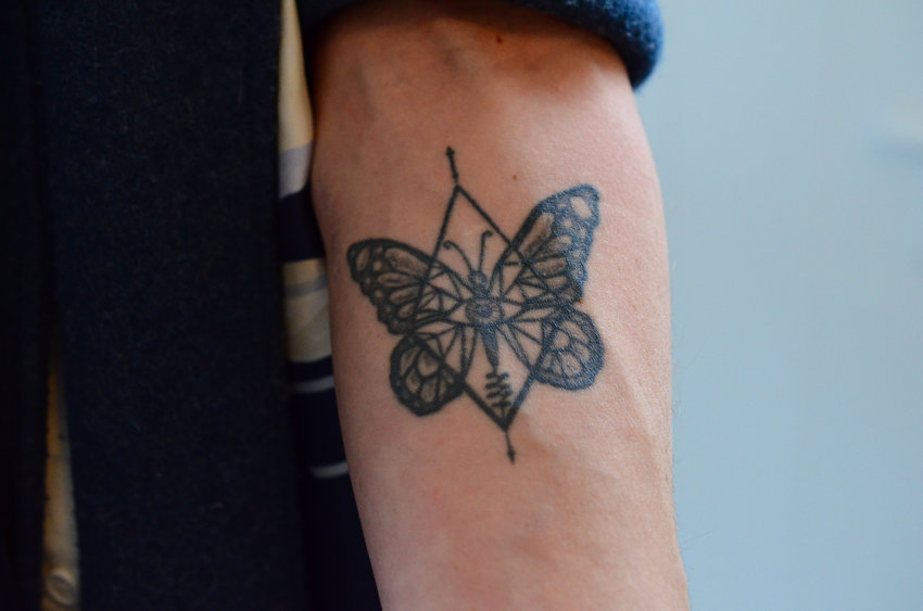 Amanda McCormick designed this tattoo, which encompasses multiple elements of her connection to femininity.